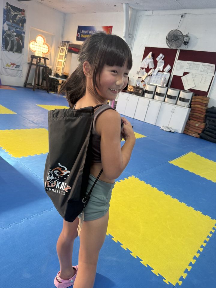 A gymnast with her Wildkatz bag